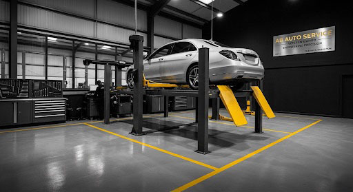 Veteran mechanic performing expert engine repair at AB Auto Service workshop in Isleham Business Park near Ely.